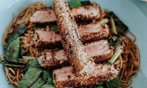 Seared sesame tuna with greens, pickled ginger and soba noodles